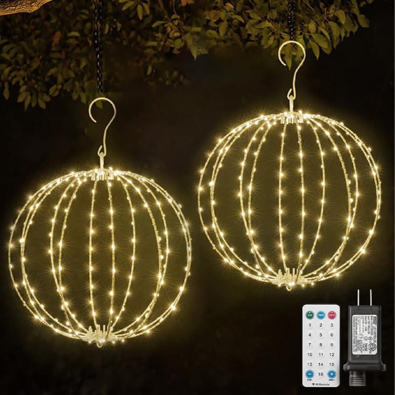 Two warm white hanging light spheres on hooks with a remote and plug adapter