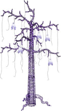 Twisted black tree with purple lights and small white ghosts hanging from the branches