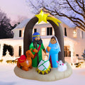 Nativity arch inflatable with Mary, Joseph, the baby, a camel and a lamb under a gold star