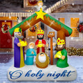 Nativity inflatable with the Holy Family and three kings under a stable with an O holy night banner