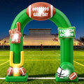 Green Game Day football arch inflatable with a helmet and a Touch Down sign on a stadium field