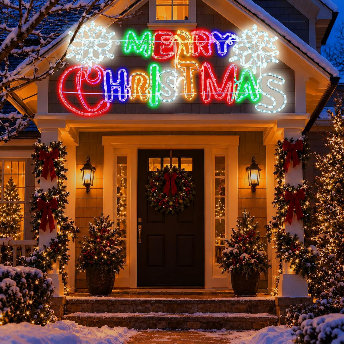 Lighted Merry Christmas LED sign in red, green and white hanging over a decorated front porch